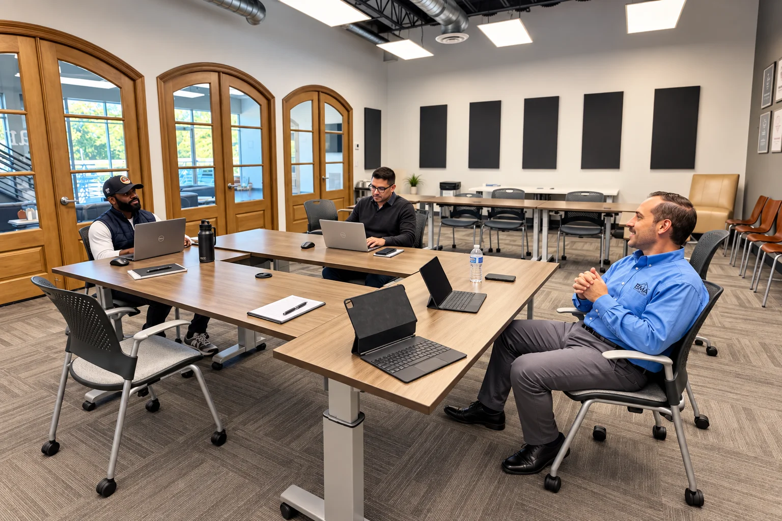 Engineering colleagues discussing a project around a conference table