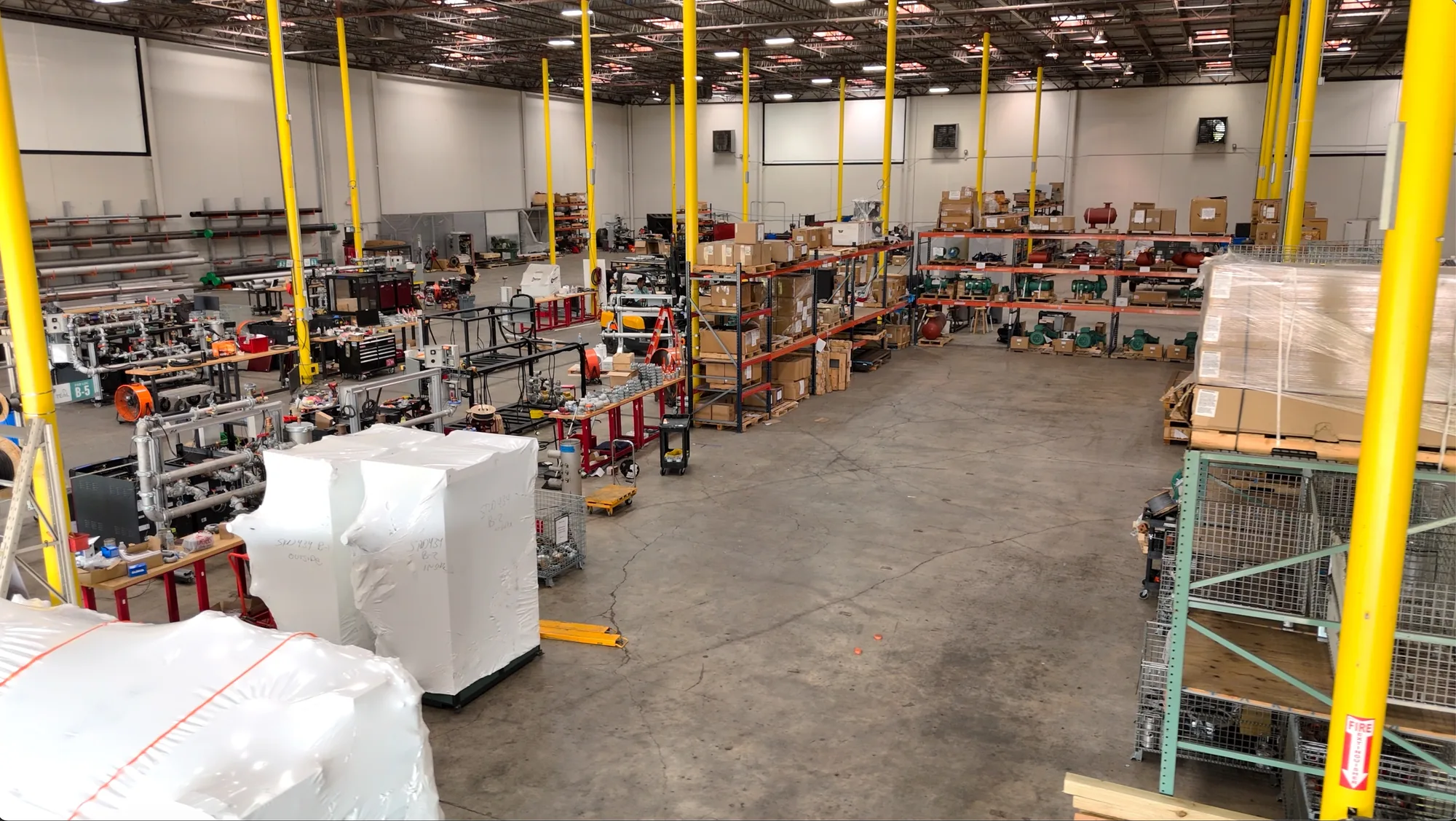 TEAL fabrication shop with equipment assemblies, workstations, and component storage